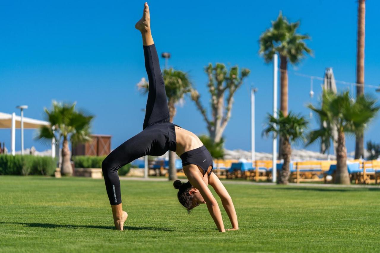 Lara Barut Collection Hotel Antalya Exterior photo A woman practicing yoga